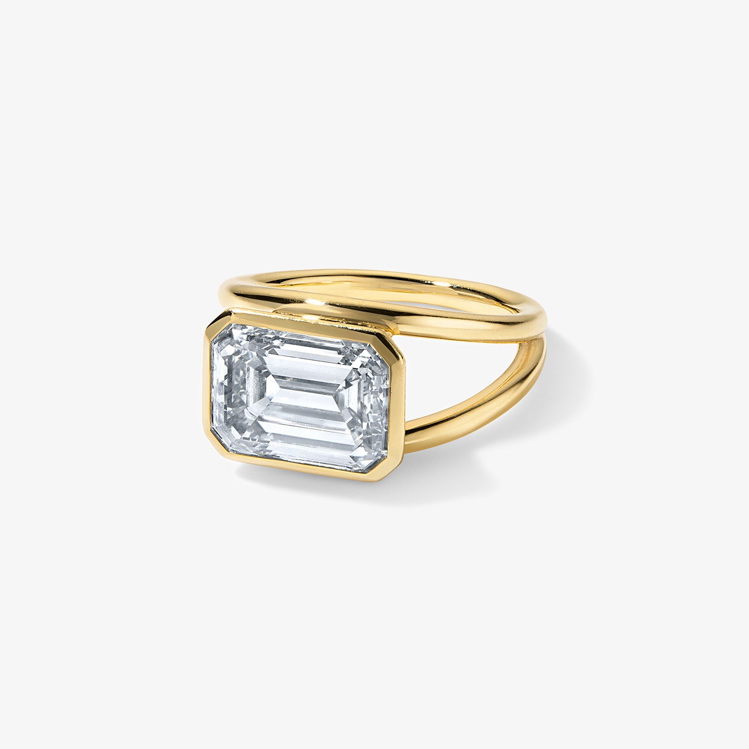 Signature Emerald Cut Bezel Set Split Shank Engagement Ring