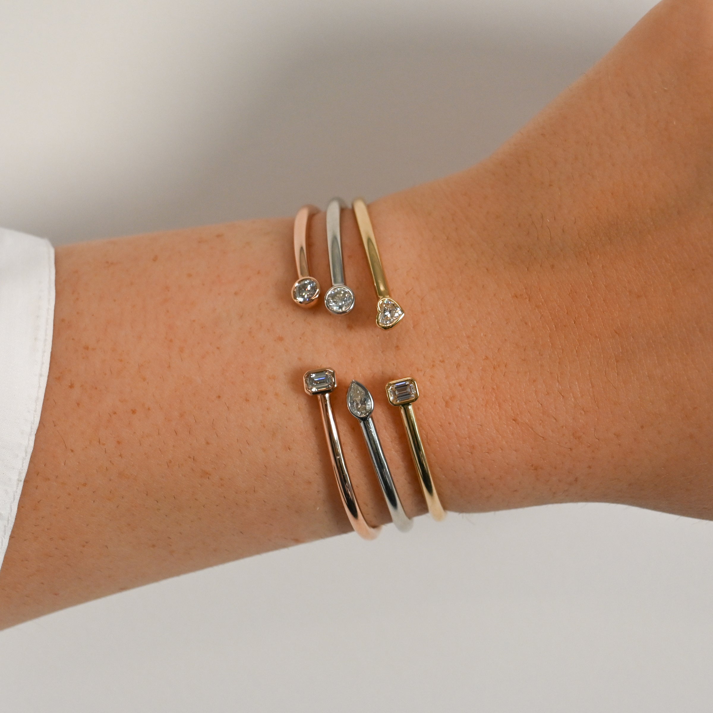 Fancy Bezel Flexible Open Cuff with Bezel Set Emerald and Heart