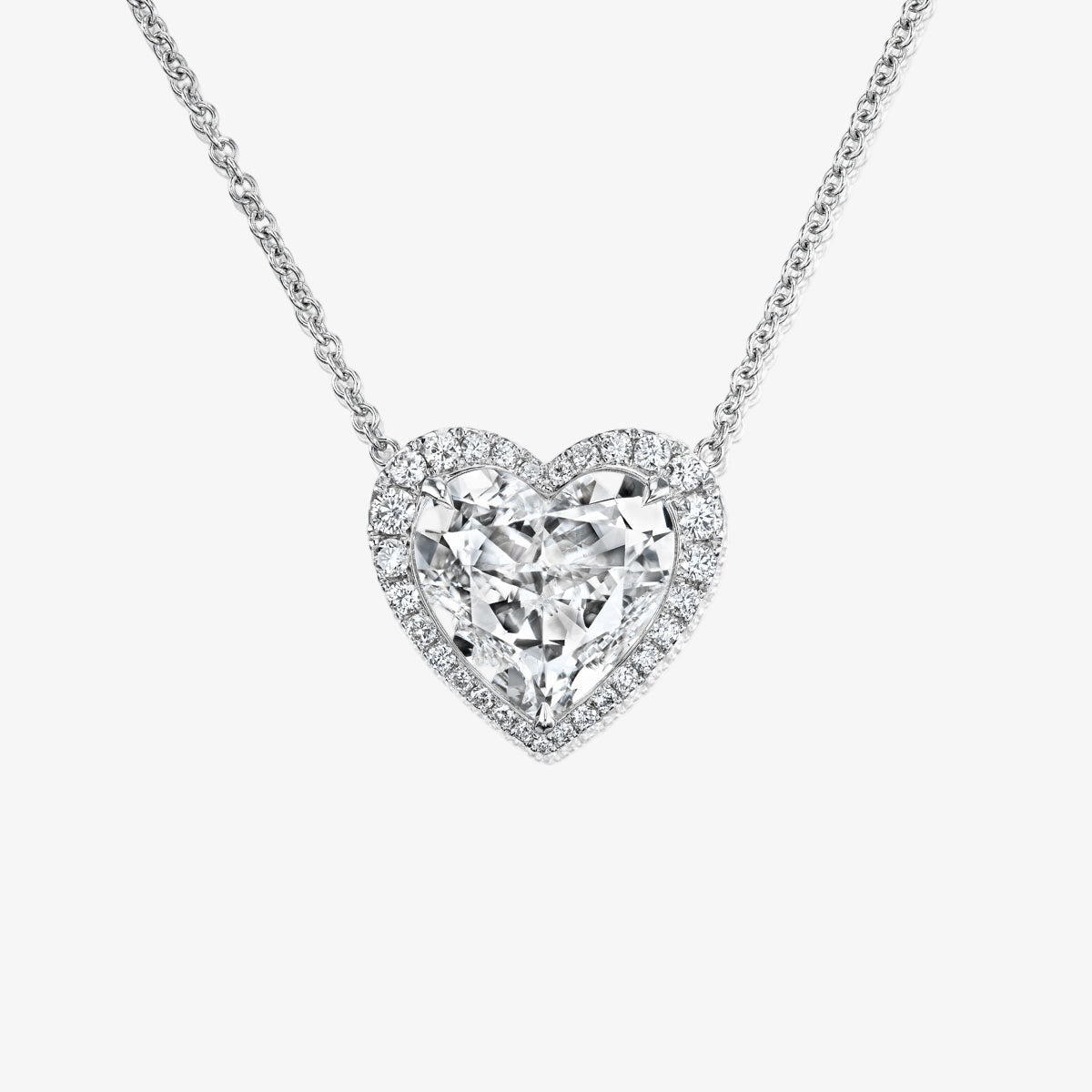 Signature Heart Shaped Diamond Pendant with Halo Platinum