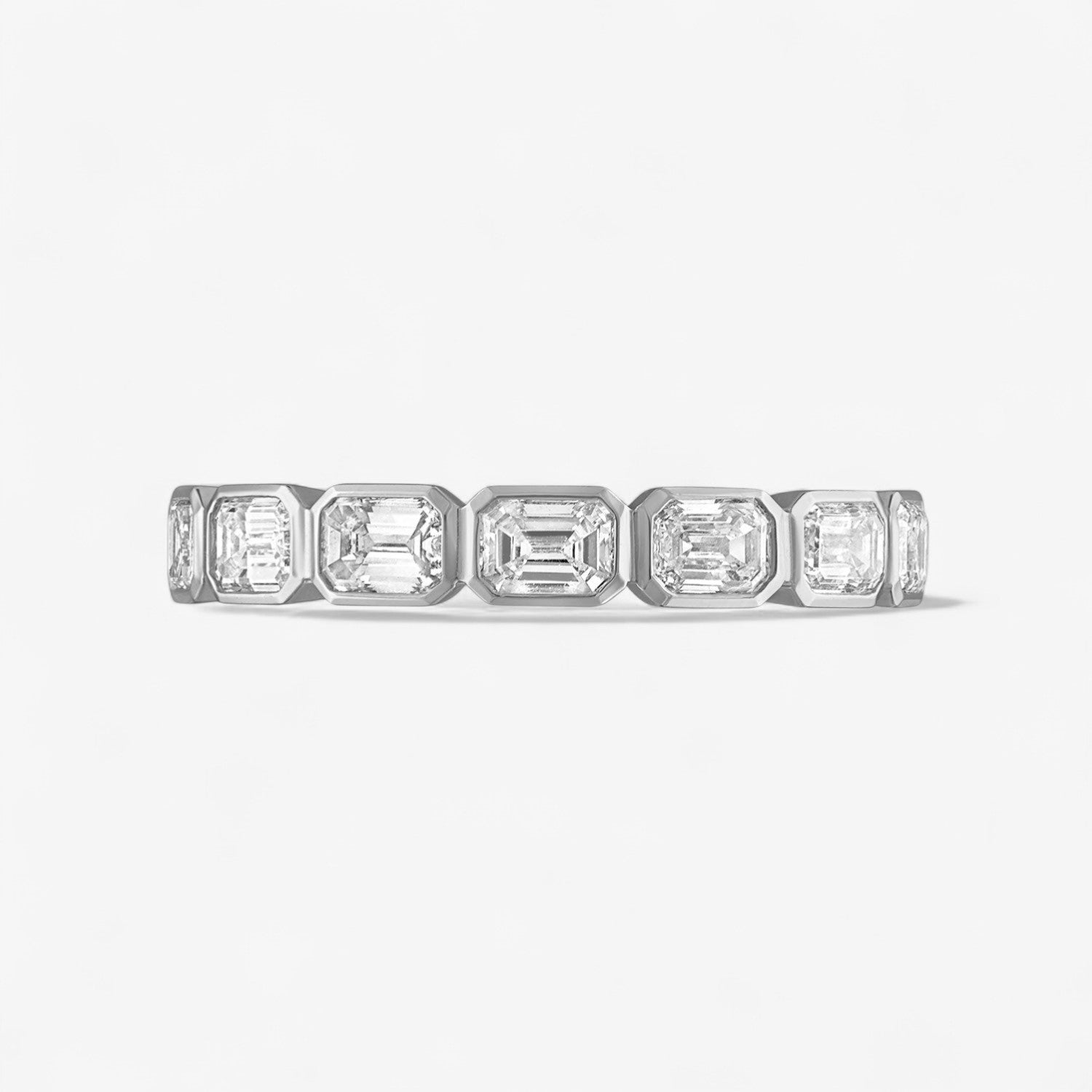 Margot Bezel Set East/West Emerald Cut Eternity Band