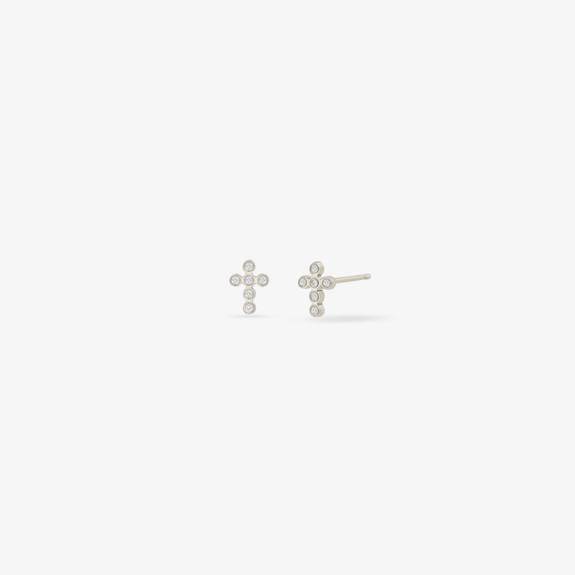 tiny bezel diamond cross studs in wg pair