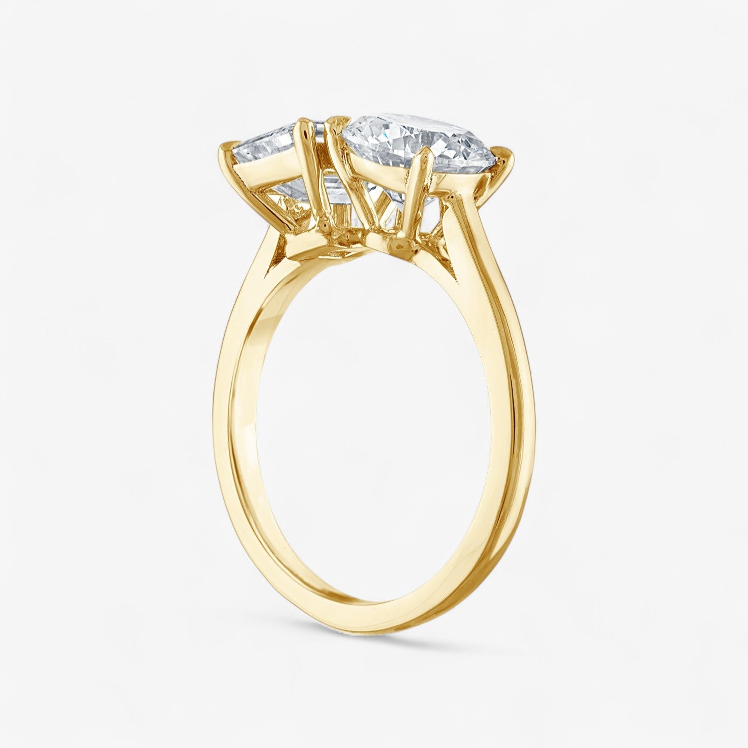 Round Cut and Emerald Cut Two-Stone Engagement Ring