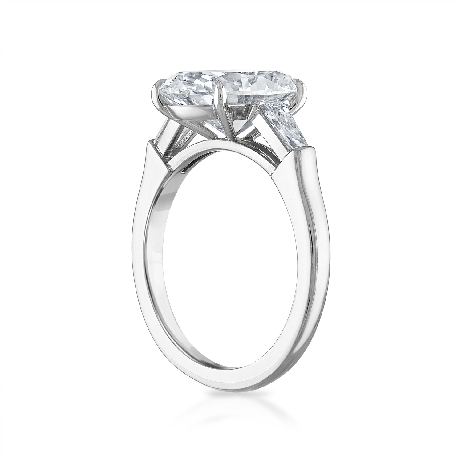 Oval Three-Stone with Tapered Baguette Side Stones Engagement Ring