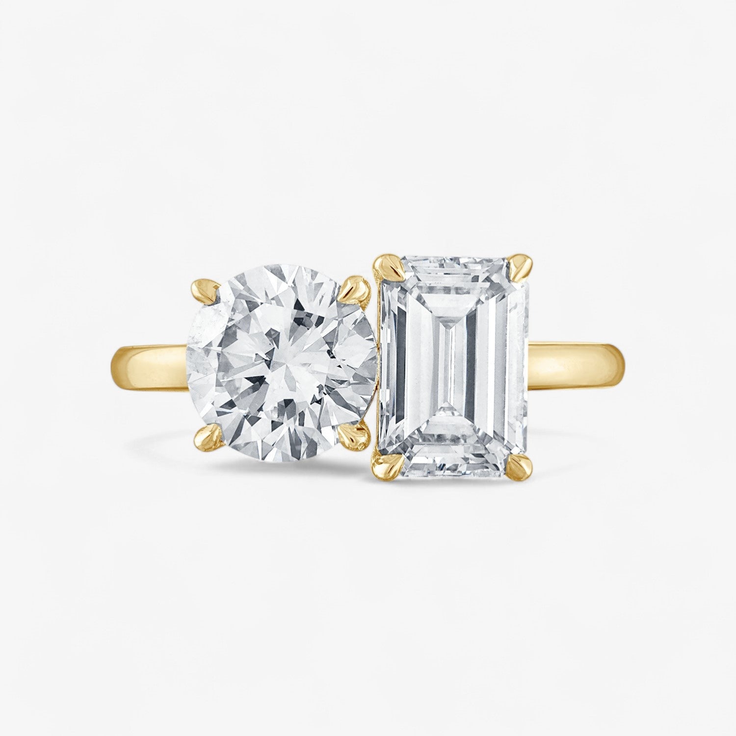 Round Cut and Emerald Cut Two-Stone Engagement Ring
