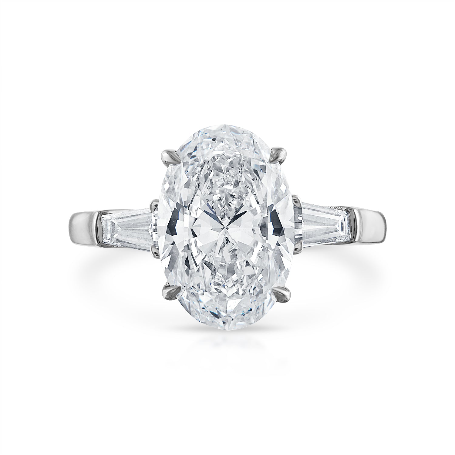 Oval Three-Stone with Tapered Baguette Side Stones Engagement Ring