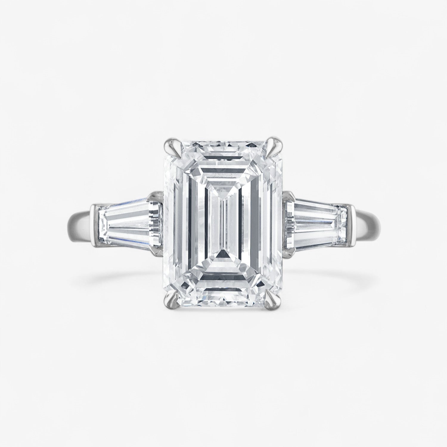 Emerald Cut Three-Stone with with Tapered Baguette Side Stones Engagement Ring