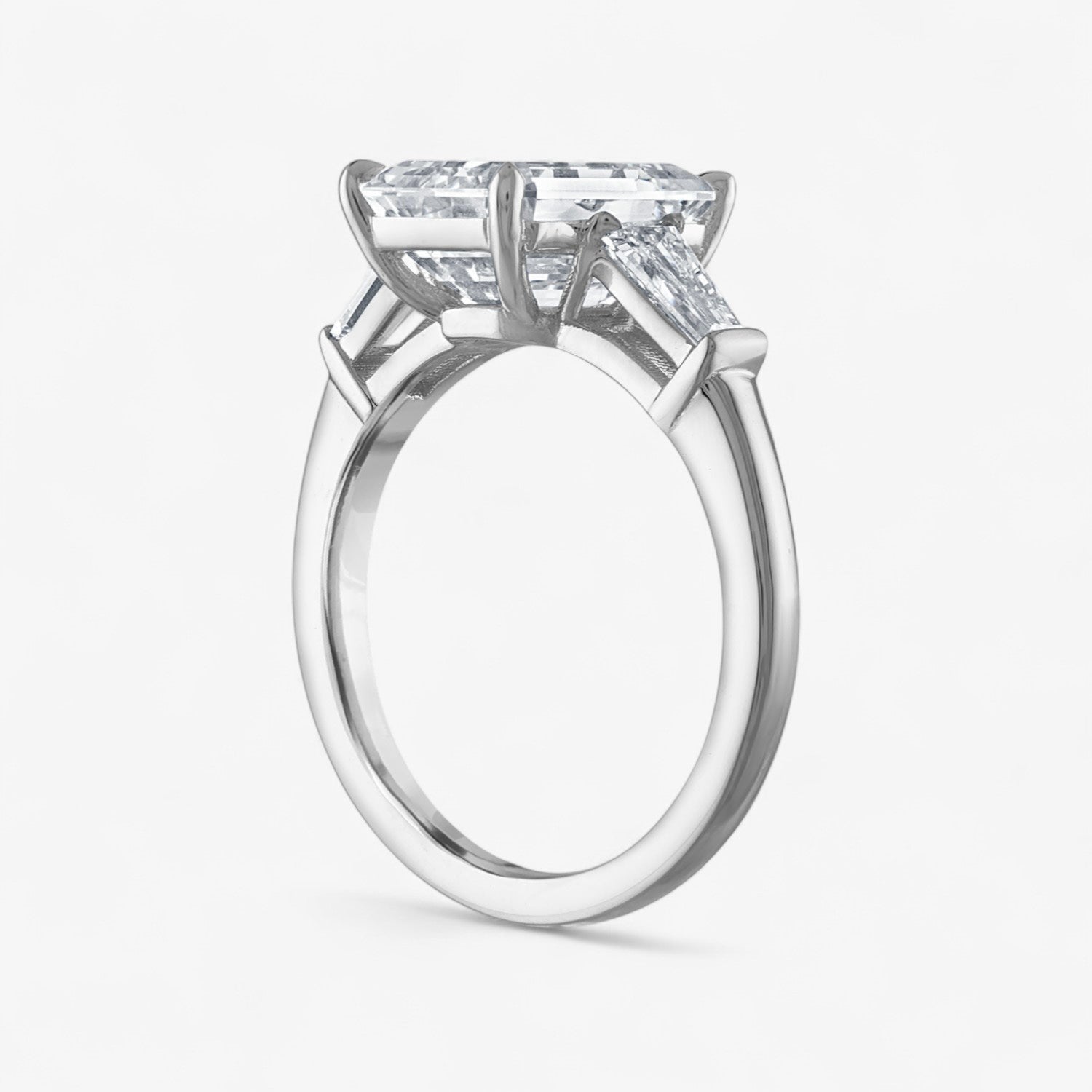 Emerald Cut Three-Stone with with Tapered Baguette Side Stones Engagement Ring