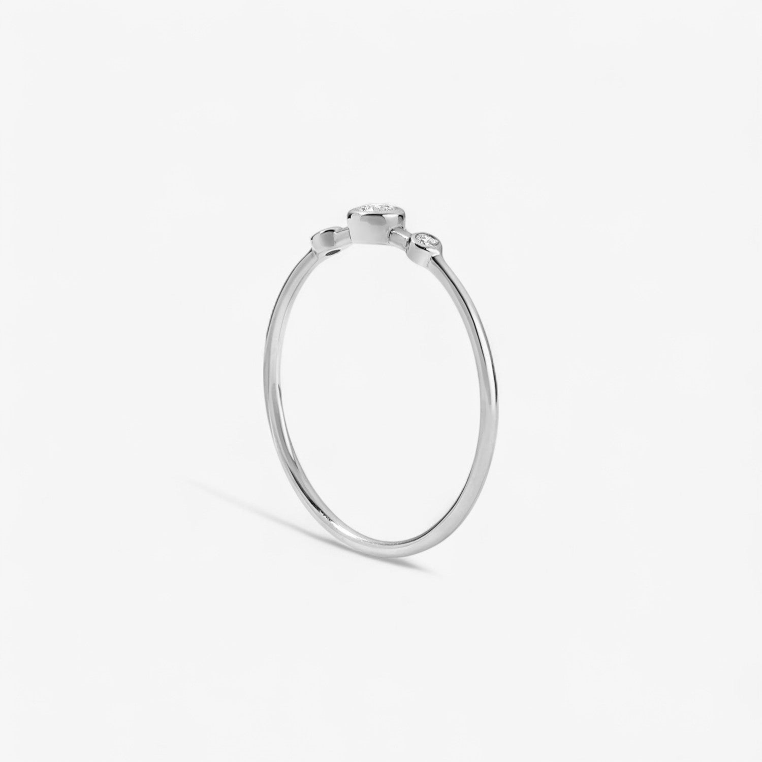 Three Diamond Bezel Ring