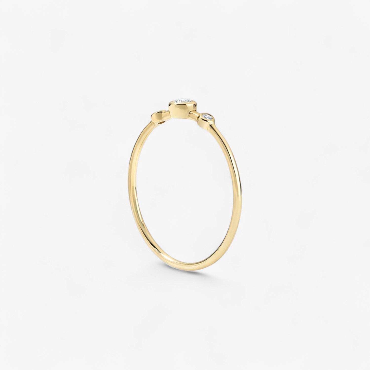 Three Diamond Bezel Ring