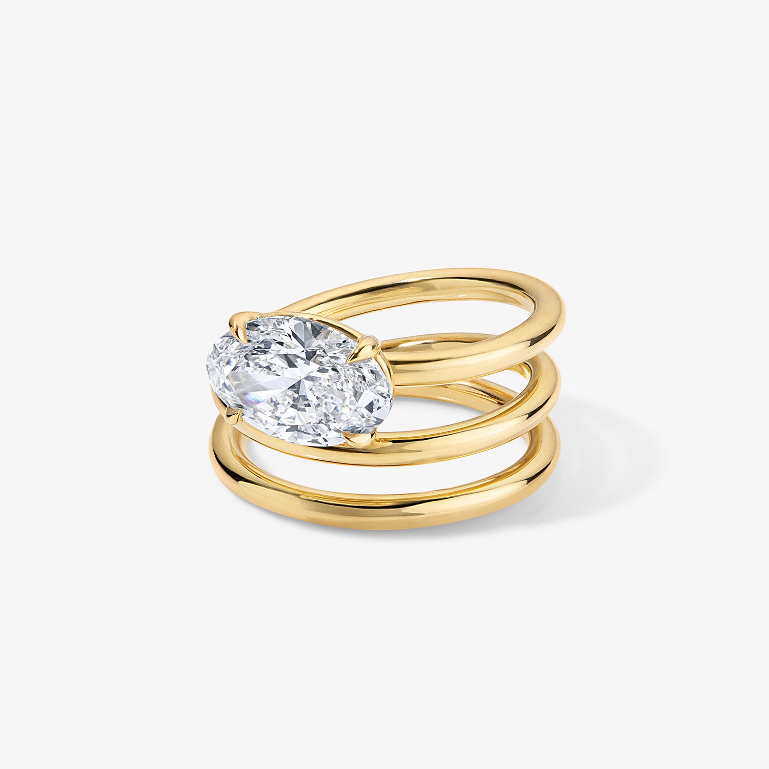 Gold Coil Ring with Oval Diamond Center