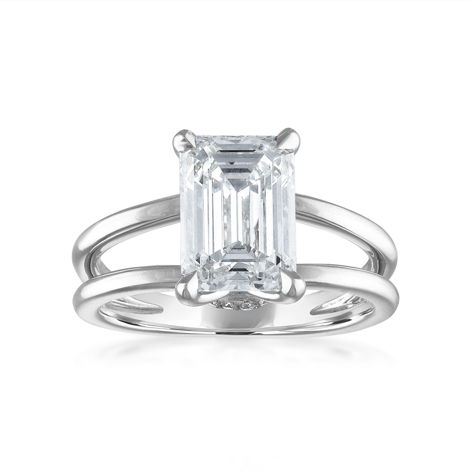 Emerald Split Shank Engagement Ring in Platinum