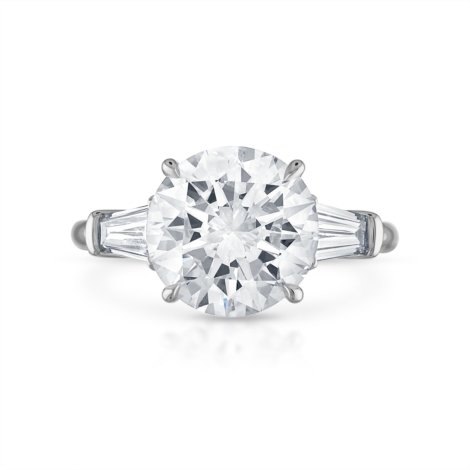 Round brilliant diamond engagement ring with tapered baguettes Outlet