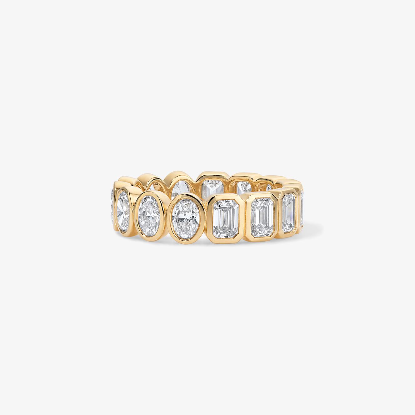 Undecided Bezel Set Emerald and Oval Band