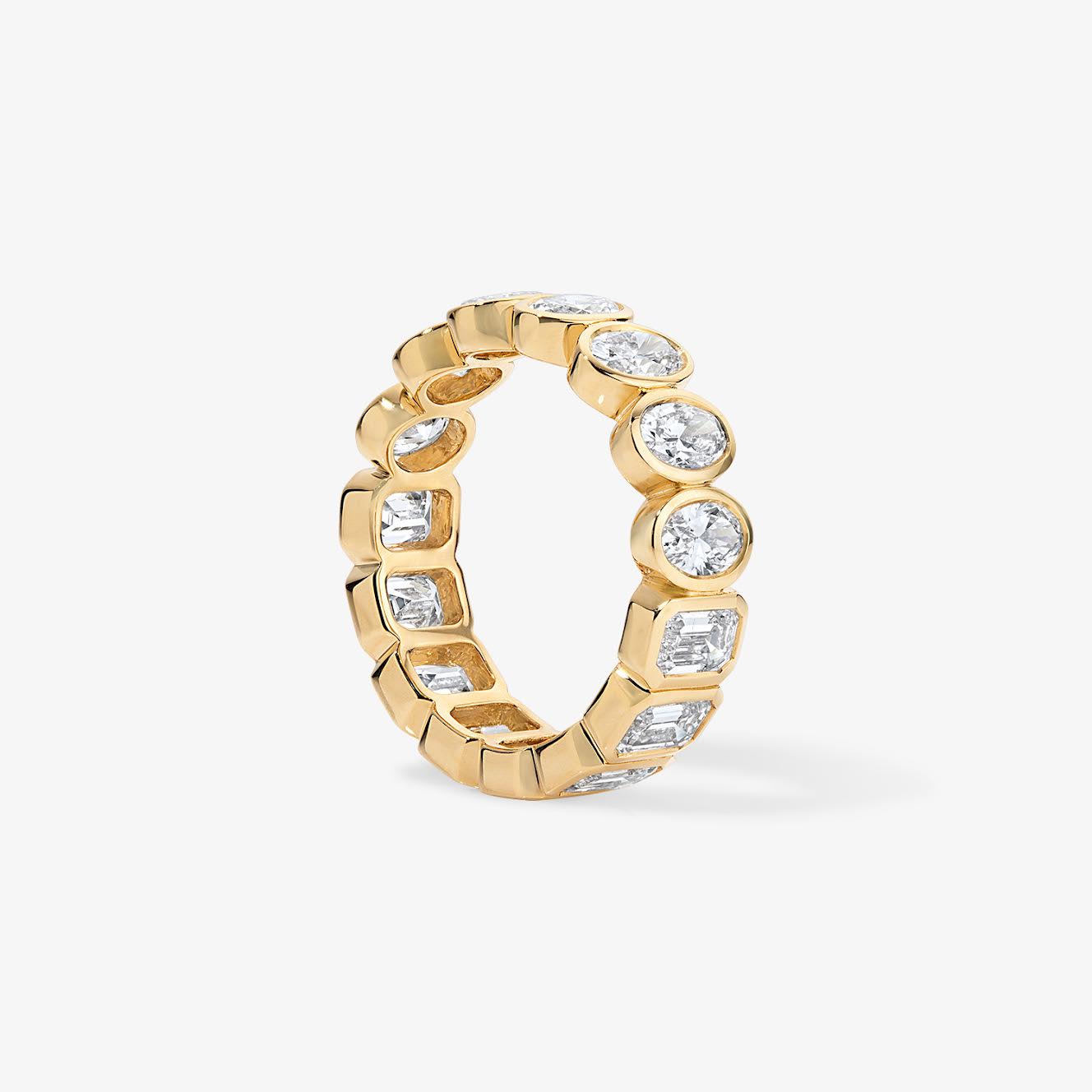 Undecided Bezel Set Emerald and Oval Band