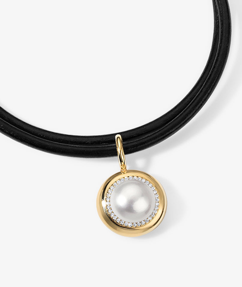 Pearl candy button pendant on leather cord