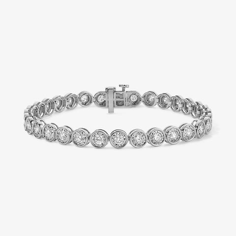 Stack of Stephanie Gottlieb bracelets featuring the Maya Illusion Tennis Bracelet