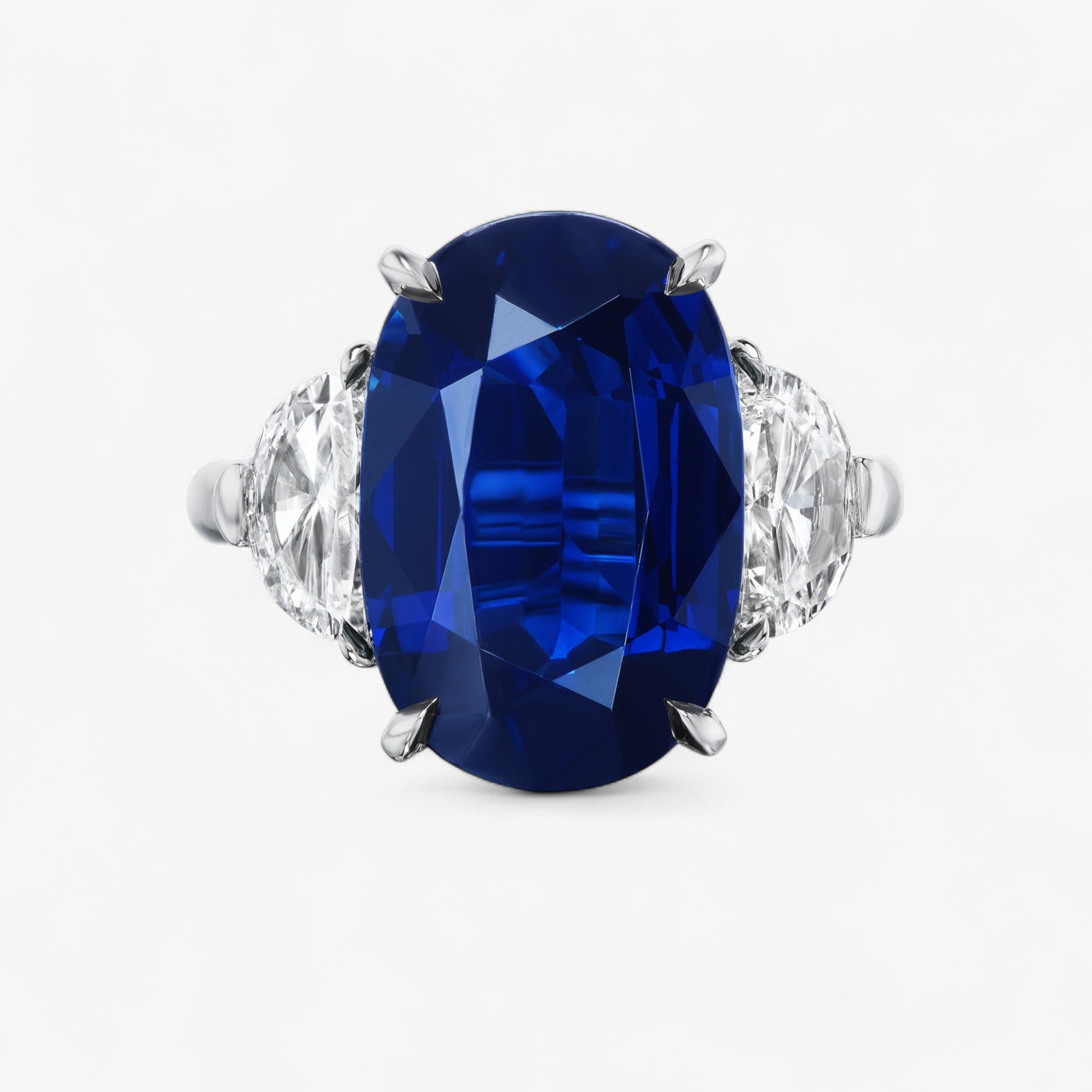 Blue Sapphire Oval Three Stone Ring