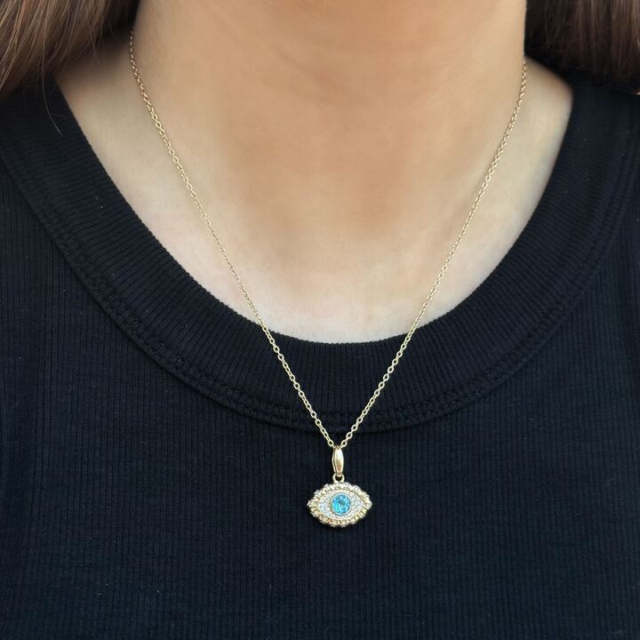 Face with store blue diamond necklace