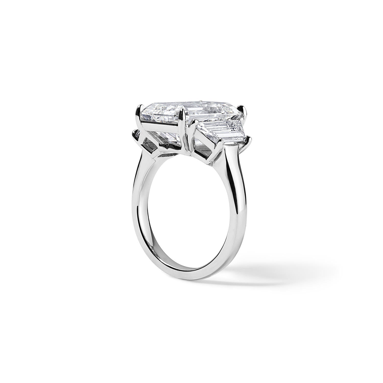 7.30CT Emerald Cut Three-Stone Ring with Trapezoid Side Stones