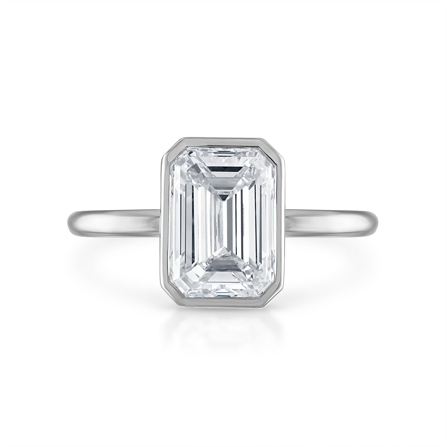 Emerald Bezel Engagement Ring in Platinum
