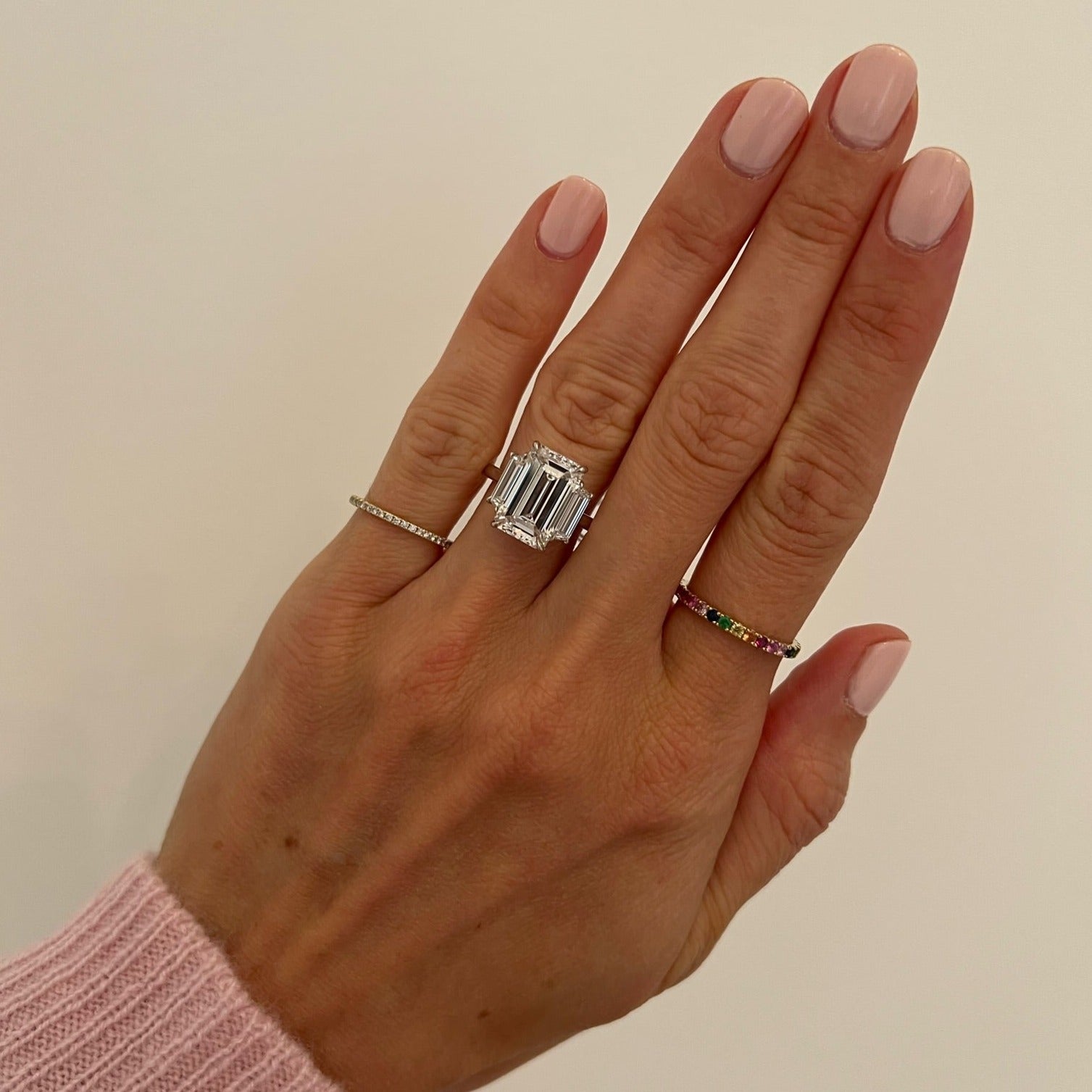 Emerald Cut Three-Stone with Trapezoid Side Stones Engagement Ring