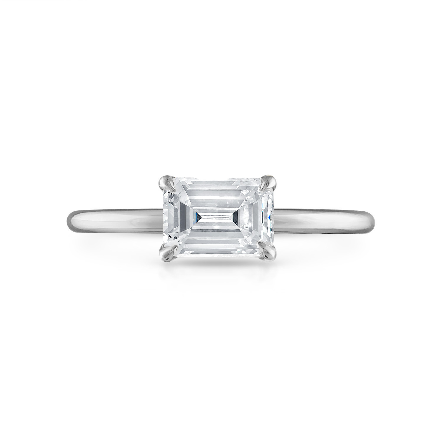 Sideways Emerald Solitaire Engagement Ring in Platinum