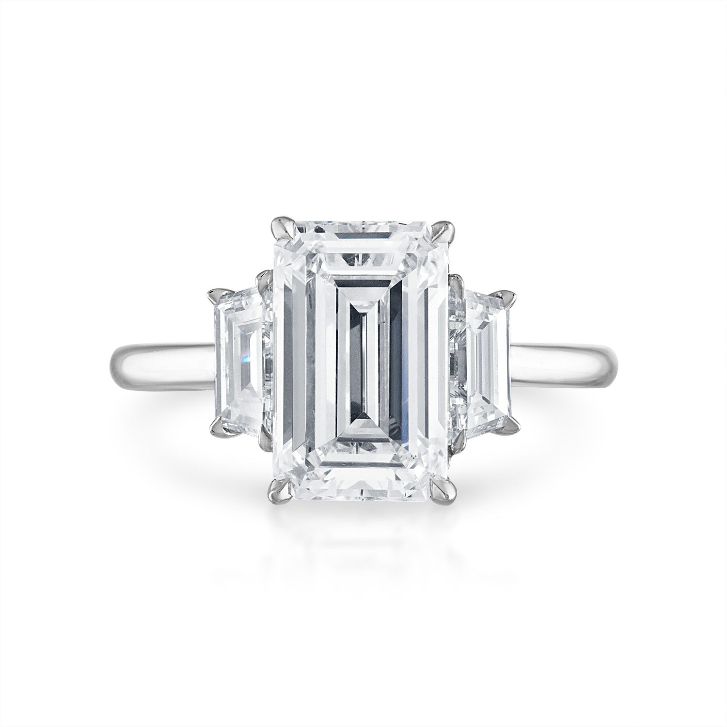 Emerald Cut Three-Stone with Trapezoid Side Stones Engagement Ring